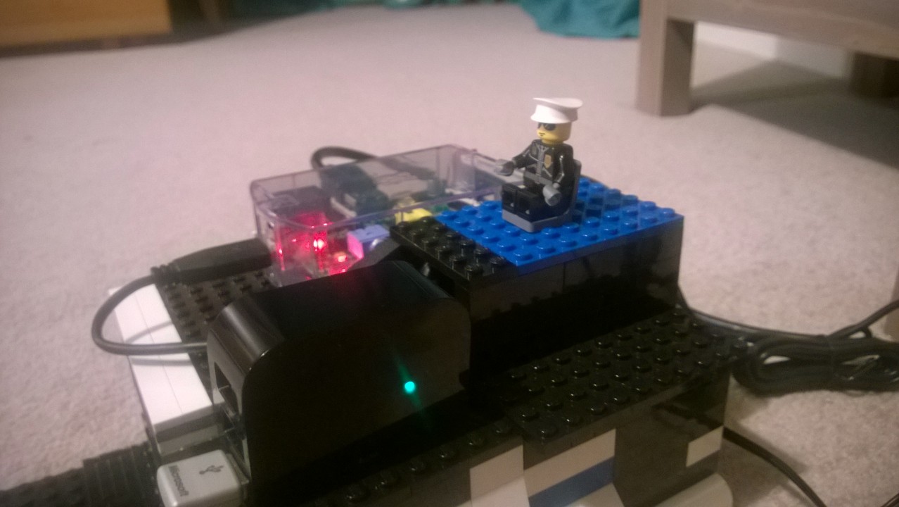 Powered USB hub standing upright in the Lego NAS enclosure