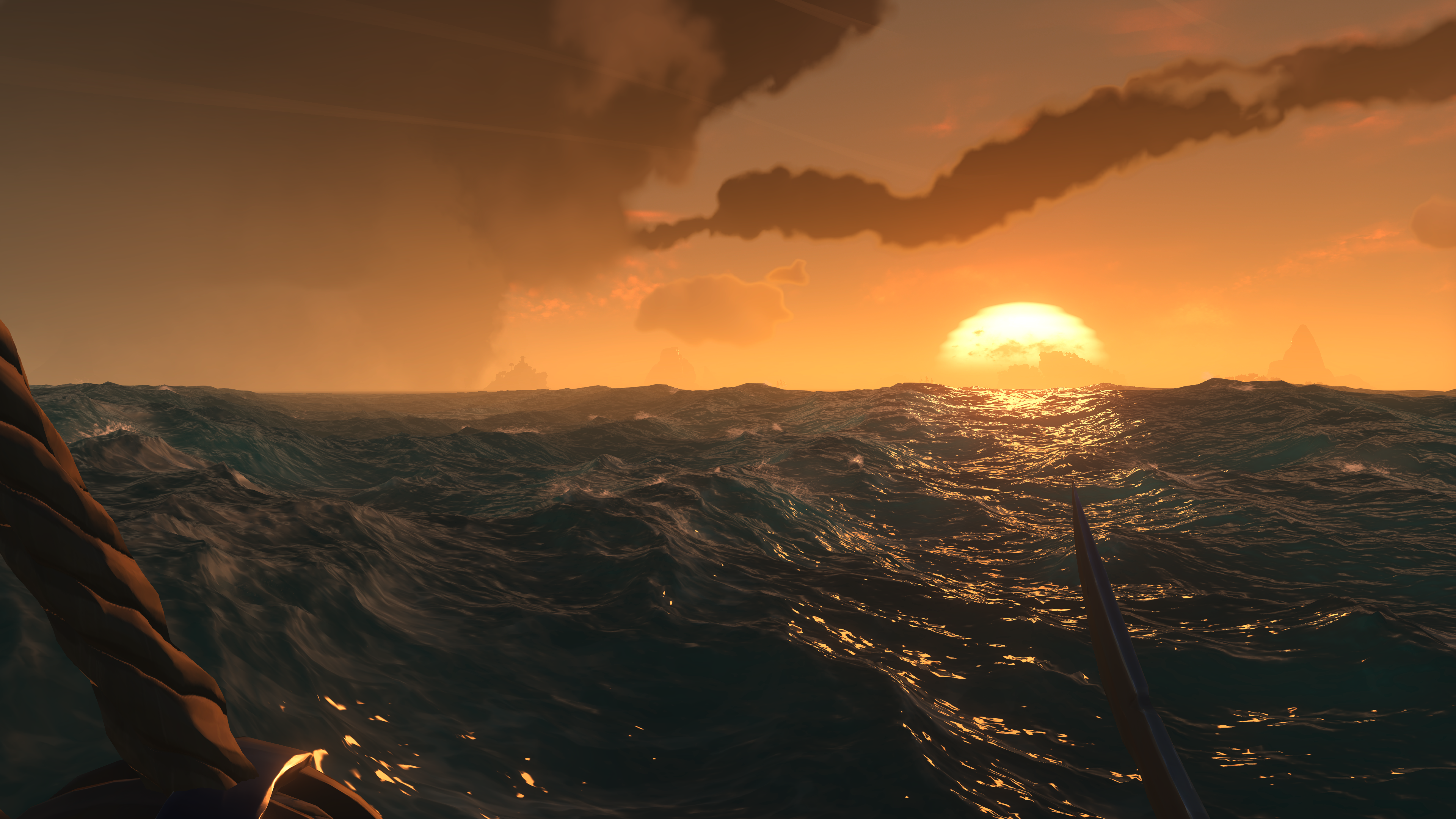 Sunset over the ocean in Sea of Thieves